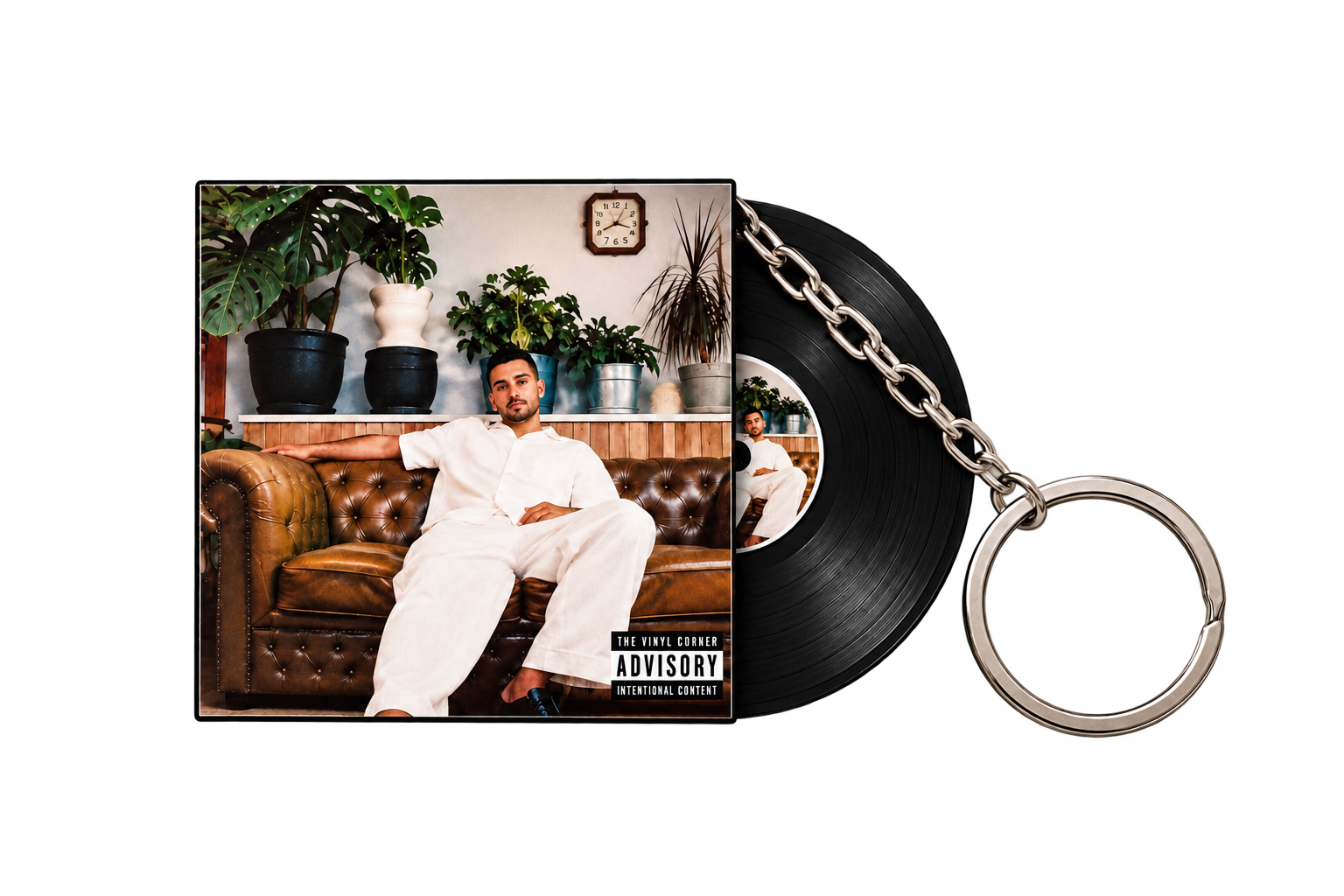 Miniature Home Sweet Home album sleeve and record attached to a silver keychain